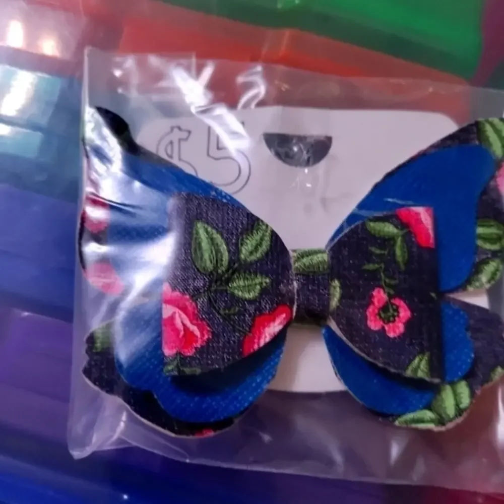 Faux leather floral butterfly clip in‎ hair bow